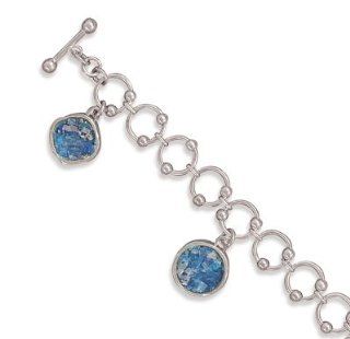 8" Ancient Roman Glass Toggle Bracelet. 4mm wide circular links feature 3mm silver balls and five 13mm ancient Roman glass drops. Color of Roman glass will vary. Jewelry