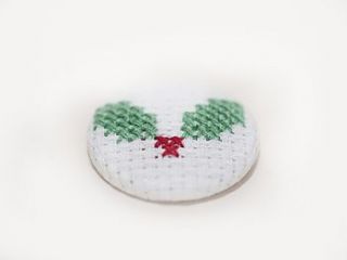 cross stitch christmas holly sprig pin badge by the bellwether