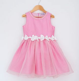 girl's twisted bow dress with pearl neckline by london kiddy