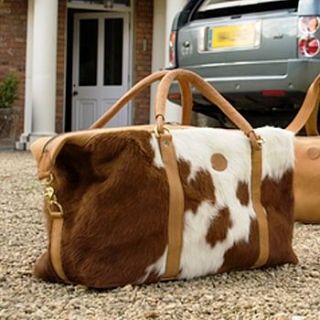 cowhide weekend bag by emma tomes