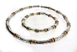 gold and silver beaten bead necklace by will bishop jewellery design