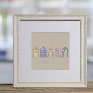 beach huts framed print by sophie morrell