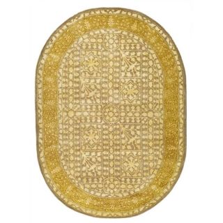 Handmade Majestic Beige/ Light Gold Wool Rug (46 X 66 Oval)