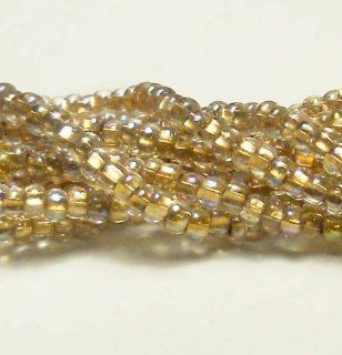 Crystal AB Bronze Lined Czech 6/0 Seed Bead on Loose Strung 6 String Hank Approx 900 Beads
