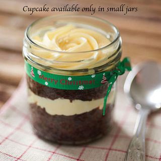 four christmas cupcakes in jars by g desserts