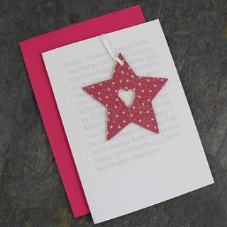 christmas card and star decoration by nest