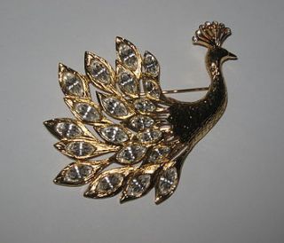vintage peacock brooch by maison ami
