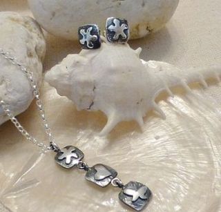 flower charm pendant and earring set by anne reeves jewellery