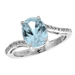 Oval Lab Created Aquamarine and Diamond Accent Ring in Sterling Silver