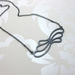 asymmetric floral pendant by jessica hewitt