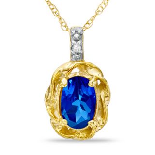 Oval Blue Sapphire and Diamond Accent Twist Frame Pendant in 10K Gold