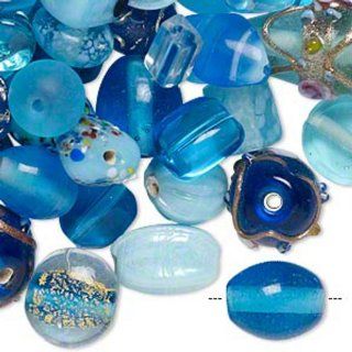 Turquoise blue with fancy finish lampworked glass mixed beads 7x4mm 14x11mm mixed shapes Sold per pkg of 100 grams, approximately 60 100 beads