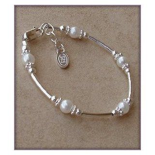 Madelyn Sterling Silver Childrens Girls Bracelet Jewelry This unique sterling silver bracelet is made with silver curved tubes and beautiful white Czech pearls accented by sparkling silver daisies on either side   a dainty and delicate touch Size Medium 1