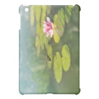 A dragonfly hovering above a lily pond iPad mini covers