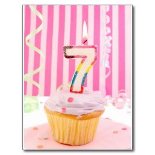 Birthday cupcake with the number 7 candle lit post cards