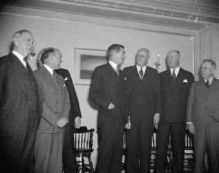 1938 photo Cabinet members chat with Anthony Eden. Washington, D.C., Dec. 13. b7  