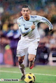 Cristiano Ronaldo kicking up turf POSTER 23.5 x 34 Portugal soccer football star playing for Real Madrid (sent FROM USA in PVC pipe)  Prints  