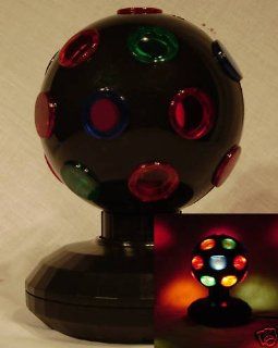 5"  BLACK OR SILVER SENT AT RANDOM  2 WAY ROTATING DISCO LIGHT BALL  DISCO BALL MULTI COLOR WITH SPINING ACTION 120V AC   CONNECTS TO WALL  NO BATTERIES NEEDED Toys & Games
